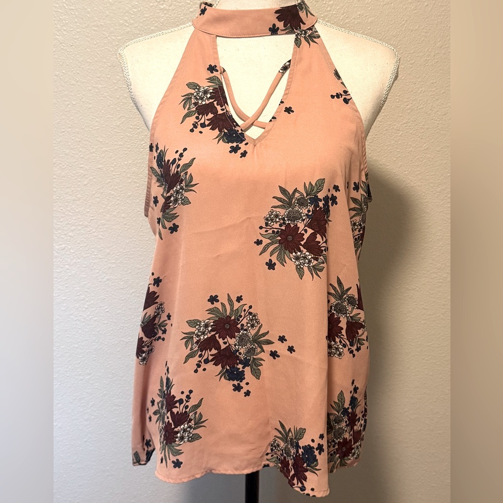 Blue Rain floral blouse from Francesca’s size M